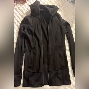 Lululemon jacket that is missing the zipper. In very good condition.